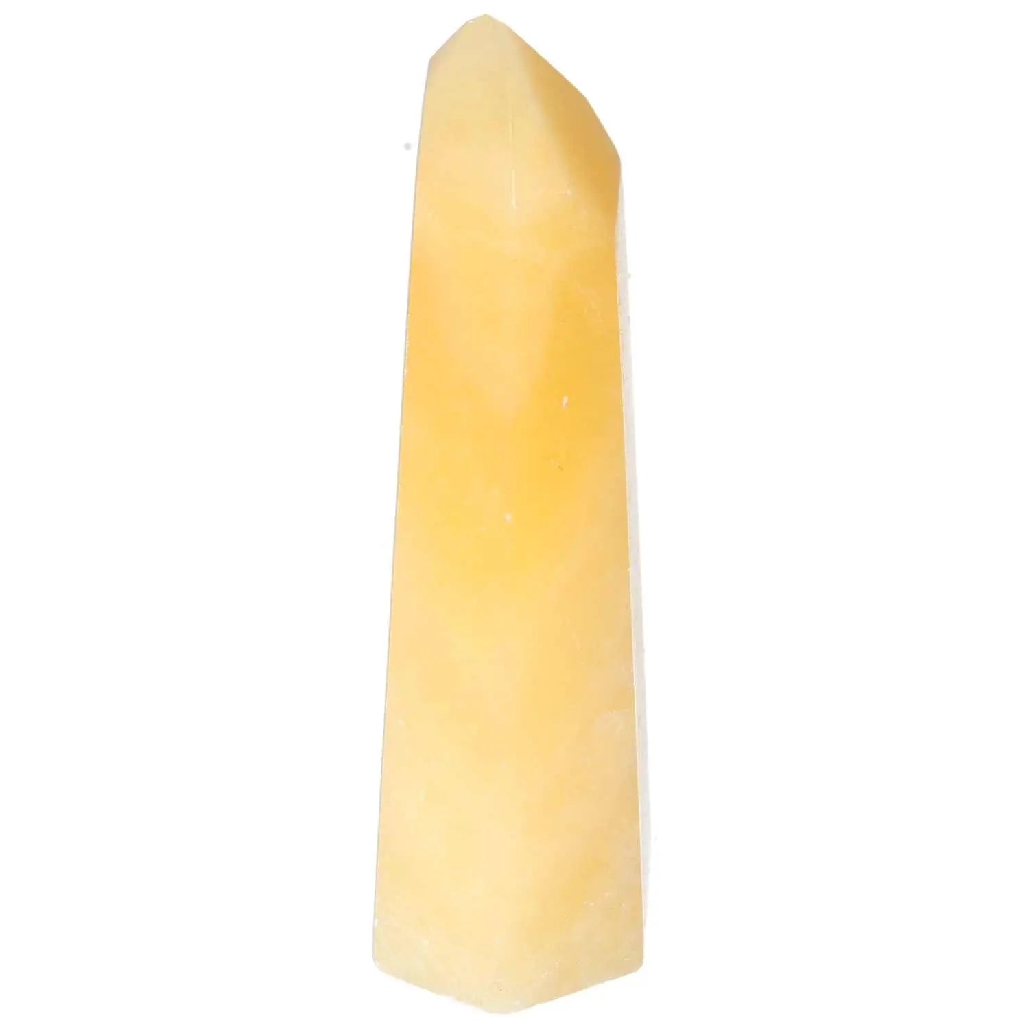 Mexican Calcite Obelisk from Sylvia Crystals, enhancing confidence and energy, a symbol of timeless elegance and conscious living.
