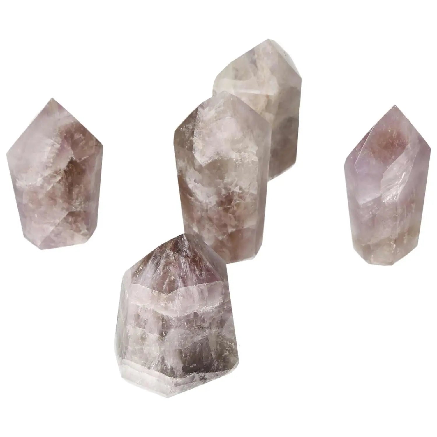 Set of seven polished amethysts from Sylvia Crystals, showcasing their unique charm and ability to enhance tranquility and focus.