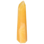 Elegant Mexican Calcite Obelisk from Sylvia Crystals, enhances self-confidence and goal achievement with transformative energy.