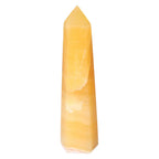 Mexican Calcite Obelisk from Sylvia Crystals, boosting confidence and focus, enhancing decor with positive energy.