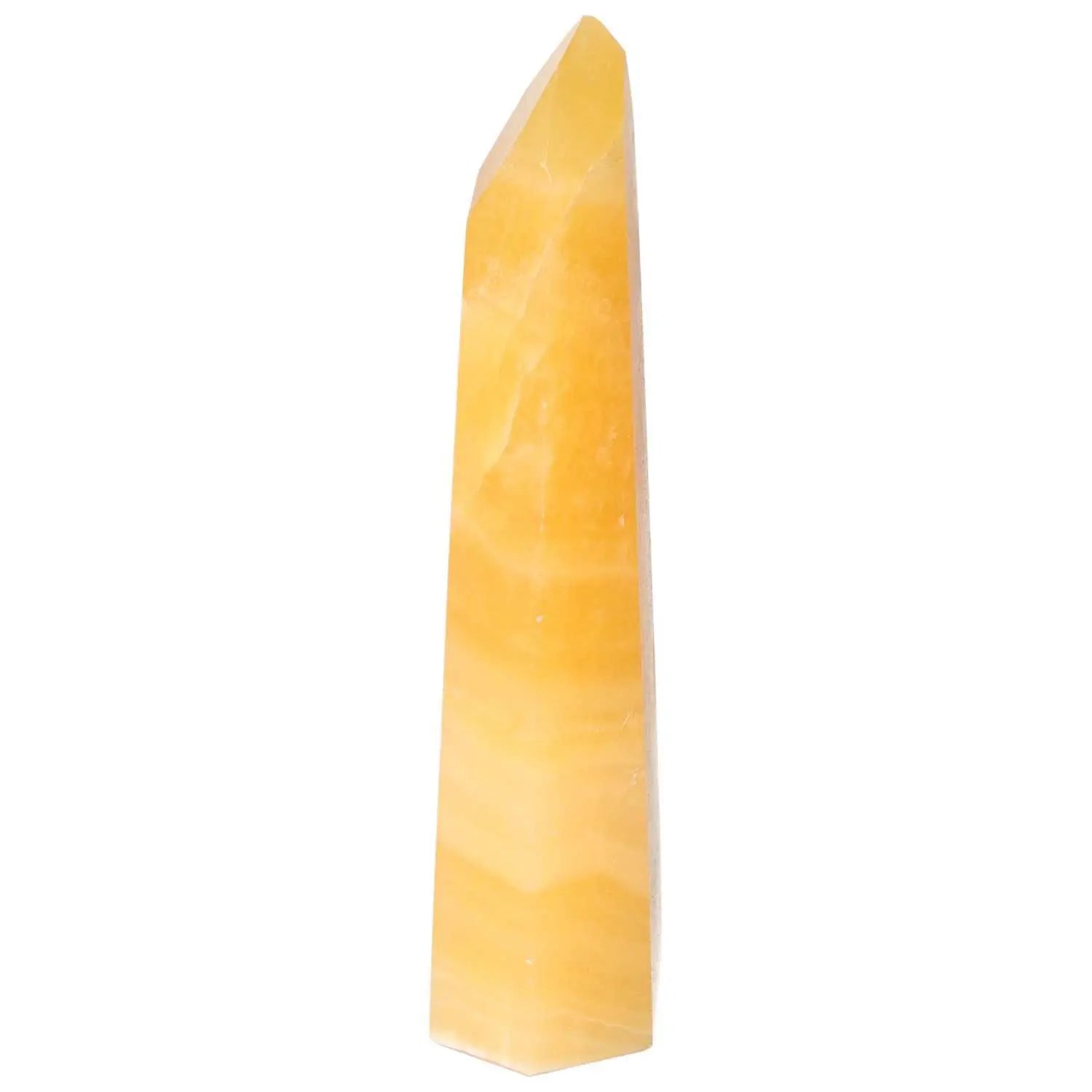Mexican Calcite Obelisk from Sylvia Crystals, a premium energy-enhancing stone for self-confidence and concentration improvement.