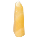 Mexican Calcite Obelisk for enhancing self-confidence and motivation from Sylvia Crystals.