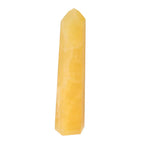 Mexican Calcite Obelisk by Sylvia Crystals, a handpicked yellow crystal for elegance and spiritual enhancement.
