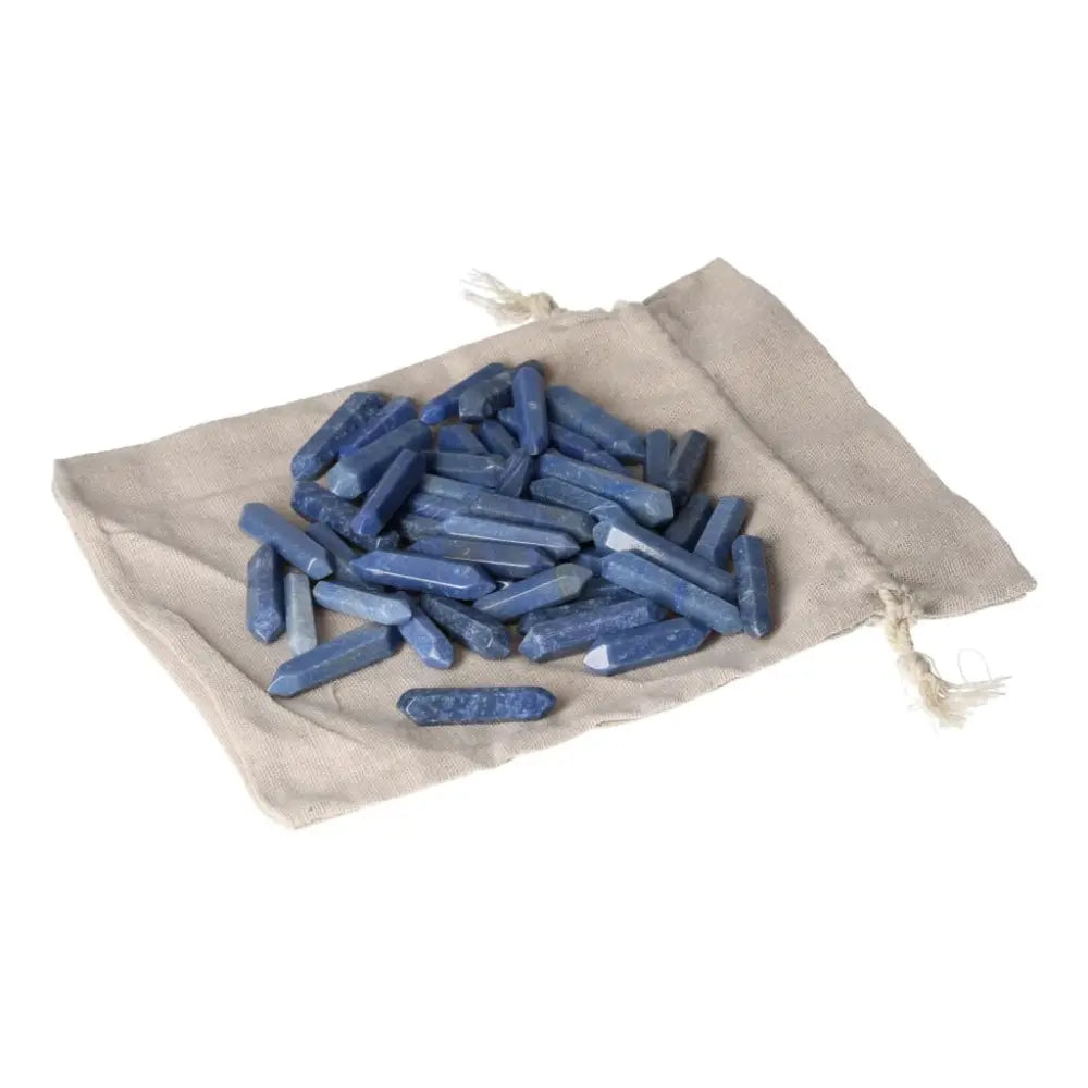 Blue Aventurine small sticks on a beige pouch, ideal for spiritual transformation and personal growth.