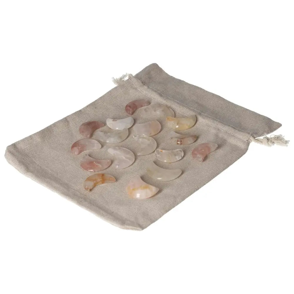 Golden Healer Small Moon crystals on a beige pouch