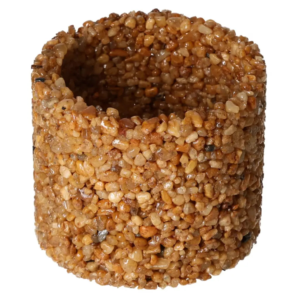 Candle holder made from natural stone showcasing unique organic patterns, offering refined luxury and spiritual elegance.