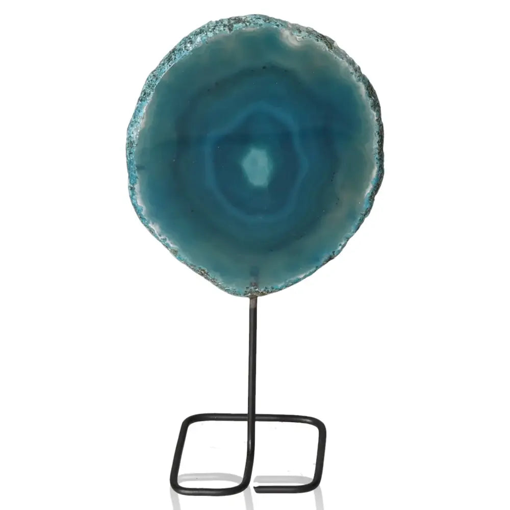 Blue agate slice on metal stand, showcasing intricate natural patterns and vibrant colors, adding elegance and tranquility to any decor.
