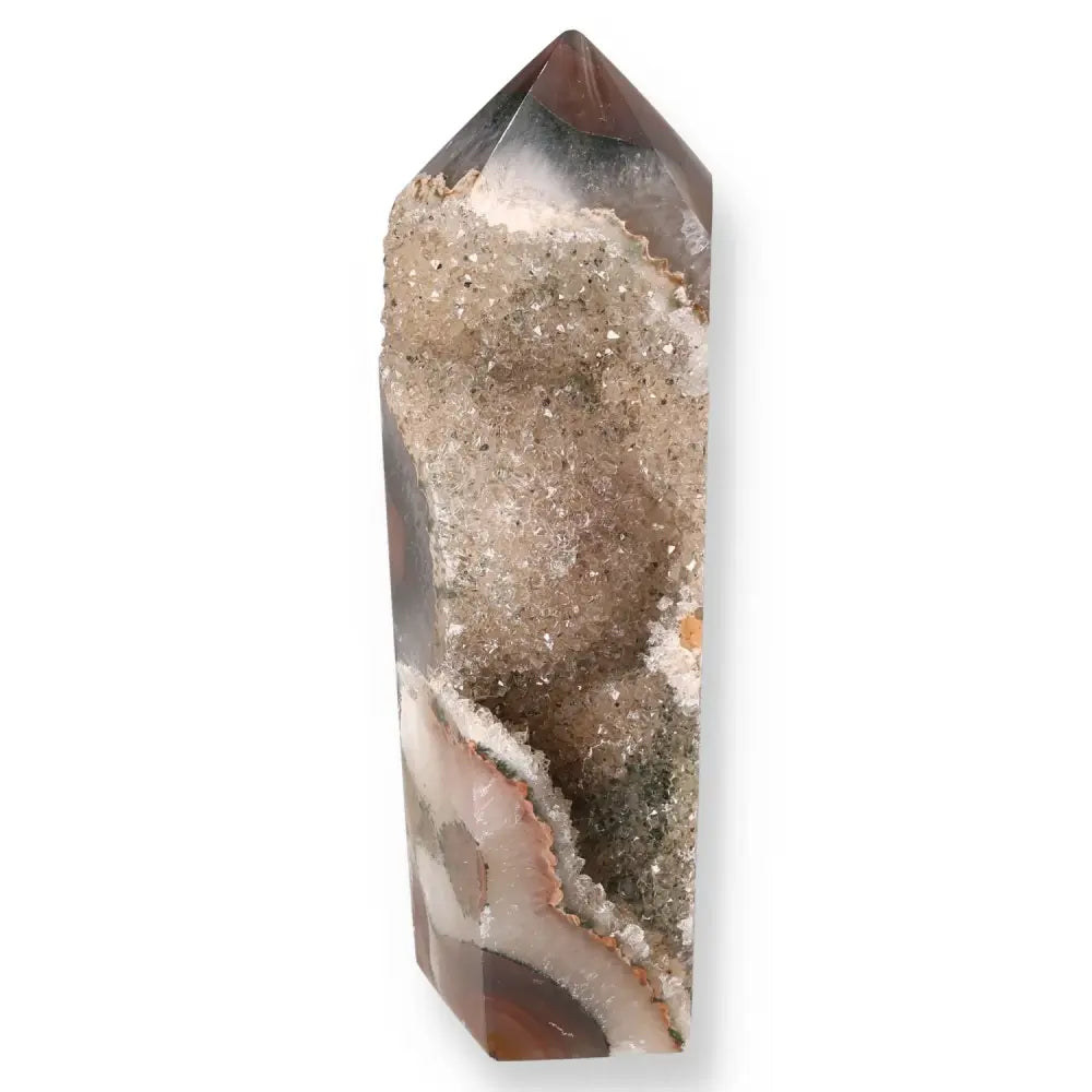 Agate Geoded Point crystal showcasing natural beauty, ideal for enhancing spiritual balance and decorative elegance.