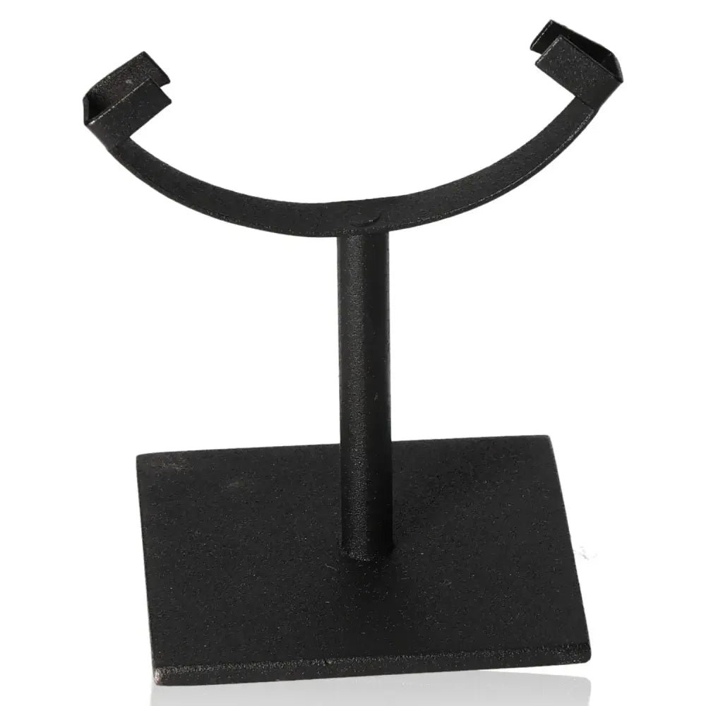 Black metal stand for displaying stones or small sculptures on a flat surface, featuring a sturdy base and open design for easy placement.