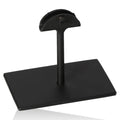 Black metal display stand designed to support and showcase decorative or precious stones.