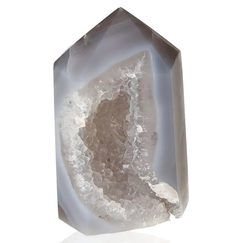 Agate Geoded Point showcasing natural beauty and energy-balancing properties for home or workspace decor.