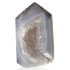 Agate Geoded Point showcasing natural beauty and energy-balancing properties for home or workspace decor.