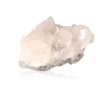 White calcite crystal from Sylvia Crystals, highlighting its energy-amplifying properties and spiritual alignment.