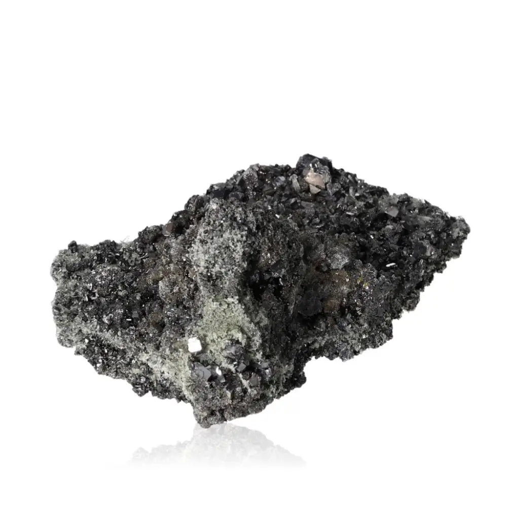 Galena mineral stone, symbolizing transformation and harmony, known for grounding and protective properties used in spiritual practices.