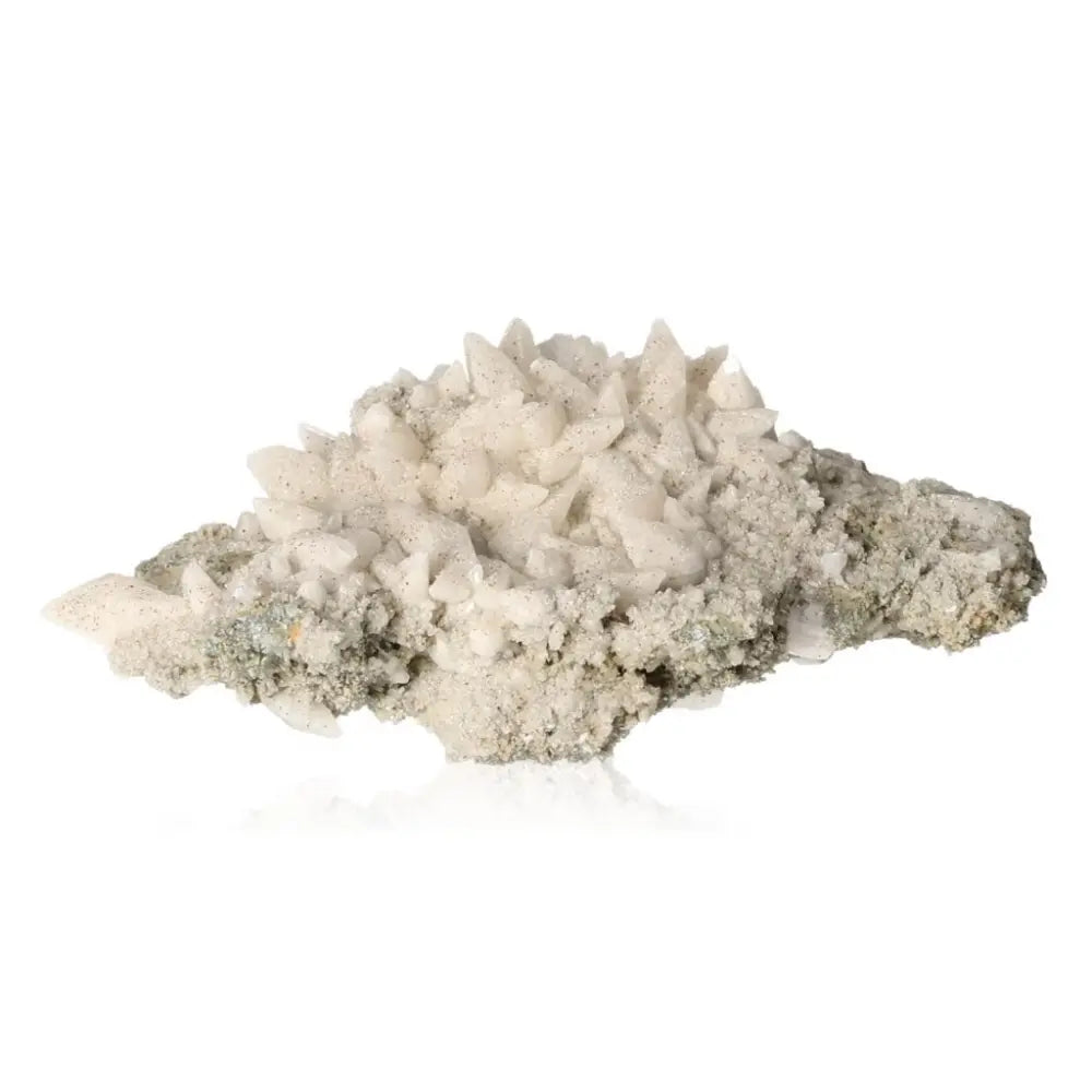 White calcite crystal cluster highlighting energy amplification and spiritual growth properties.