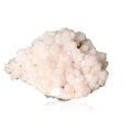 Soft pink Mangano Calcite crystal promoting love, compassion, and emotional healing; known as the Stone of Forgiveness.