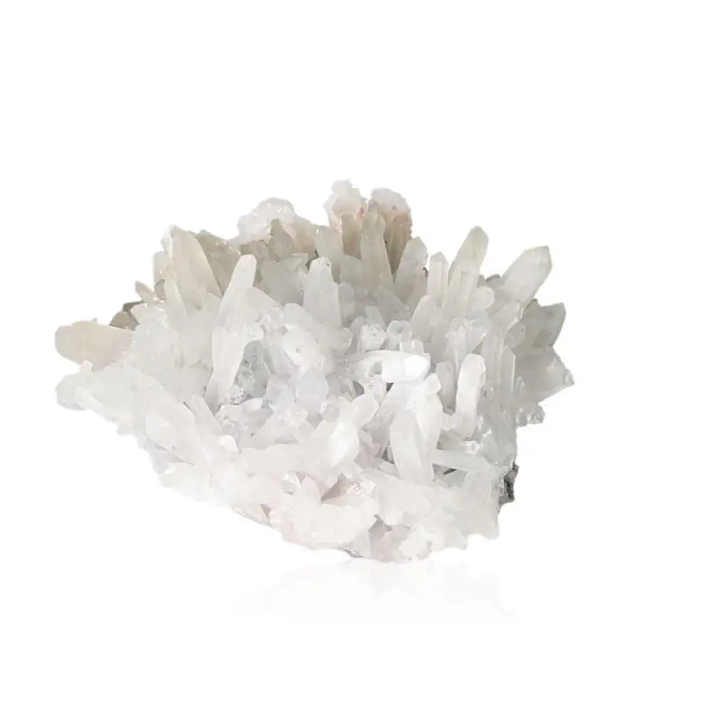 Clear quartz crystal cluster showcasing its brilliant clarity and energy-enhancing properties against a white background.