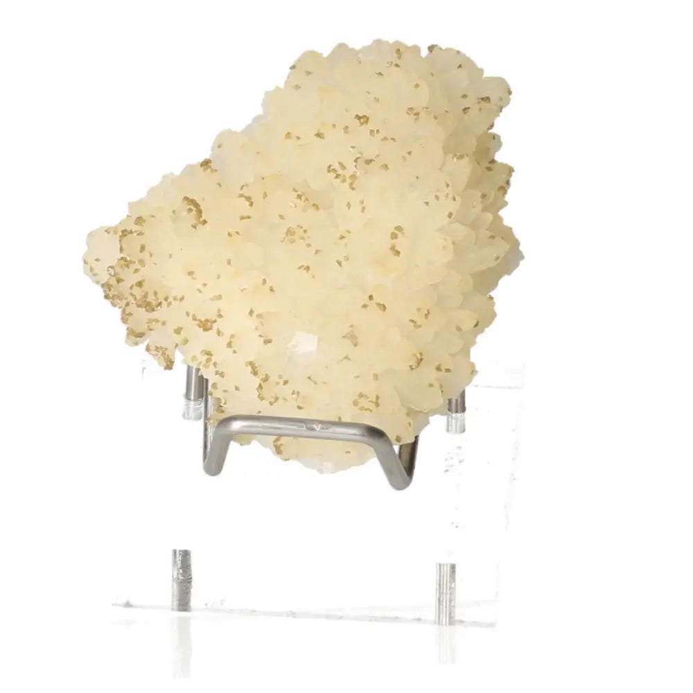 Milky Quartz with Siderite gemstone on display, showcasing its soft hue and textured surface, from Sylvia Crystals collection.