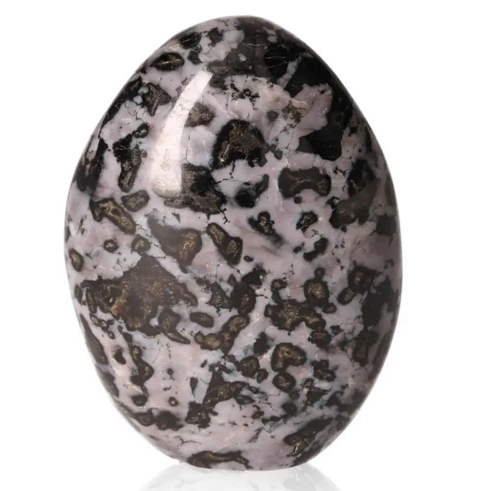 Indigo Gabbro free form stone with black and indigo swirling patterns, known for enhancing intuition and spiritual growth.