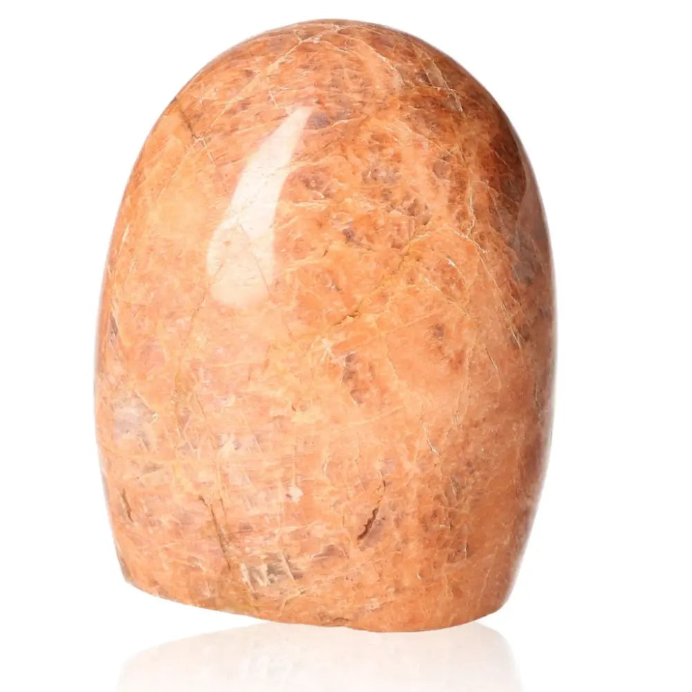 Peach Moonstone Free Form with soothing peach hue, ideal for emotional healing and calming energy.