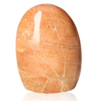Peach Moonstone Free Form Stone, nurturing with soft peach hue, promotes inner peace and emotional healing, ideal for new beginnings.