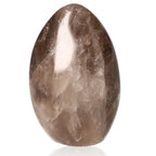 Black moonstone free form gemstone with shimmering effects, displaying chatoyancy for energy protection and healing.