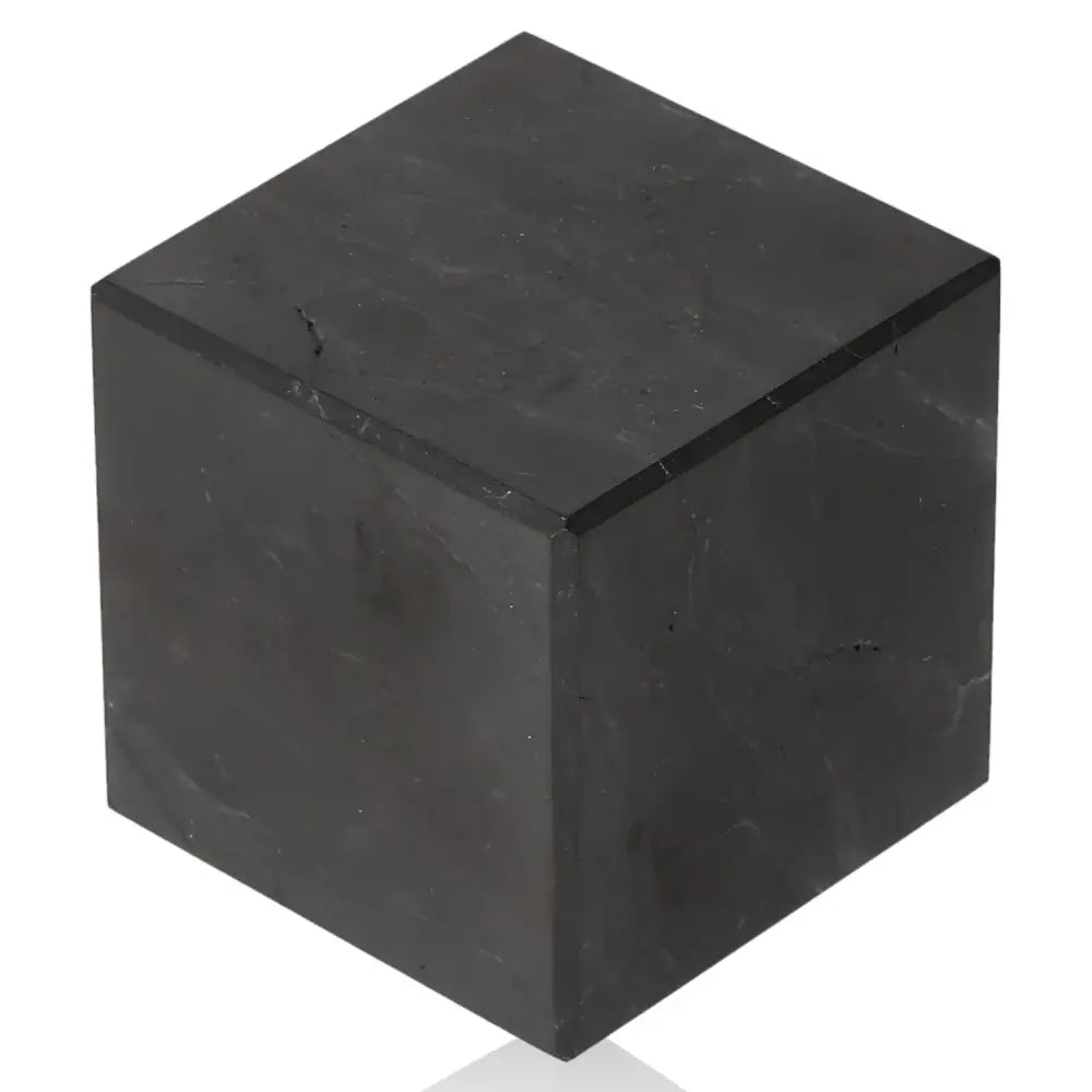 Shungite Cube 5 cm from Sylvia Crystals, showcasing natural elegance and wellness benefits, ideal for luxury decor and protection.