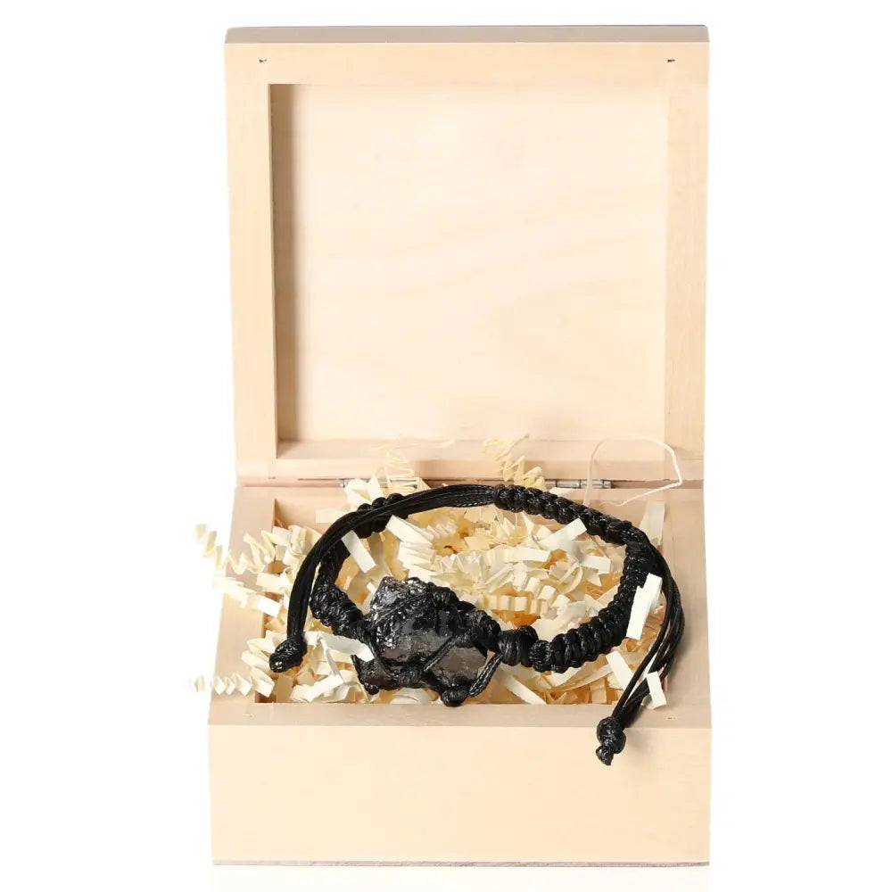 Shungite Bracelet in elegant wooden box, showcasing protective energy properties and luxury design from Sylvia Crystals.