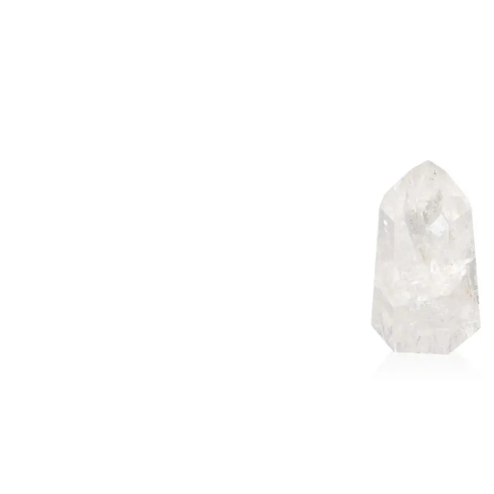 Elegant Lemurian Quartz Obelisk offering luxury, aesthetics, and spiritual resonance from Sylvia Crystals.
