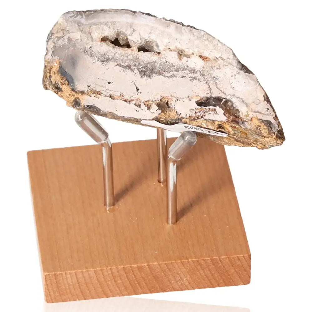 Mini Agate Geode on display stand, showcasing natural beauty and harmony, ideal for home or office decor and energy balance.