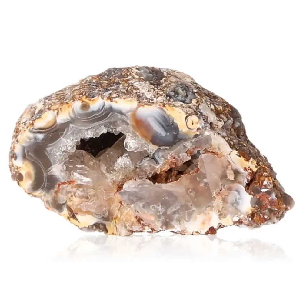 Mini Agate Geode showcasing natural patterns and vibrant hues with layers of blues and earthy tones, highlighting the beauty of nature.