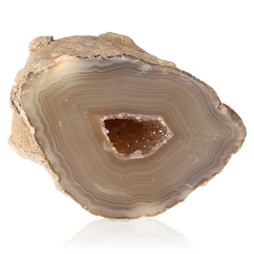 Mini Agate Geode showcasing natural patterns and vibrant colors, perfect for decor and adding balance and harmony to any space.