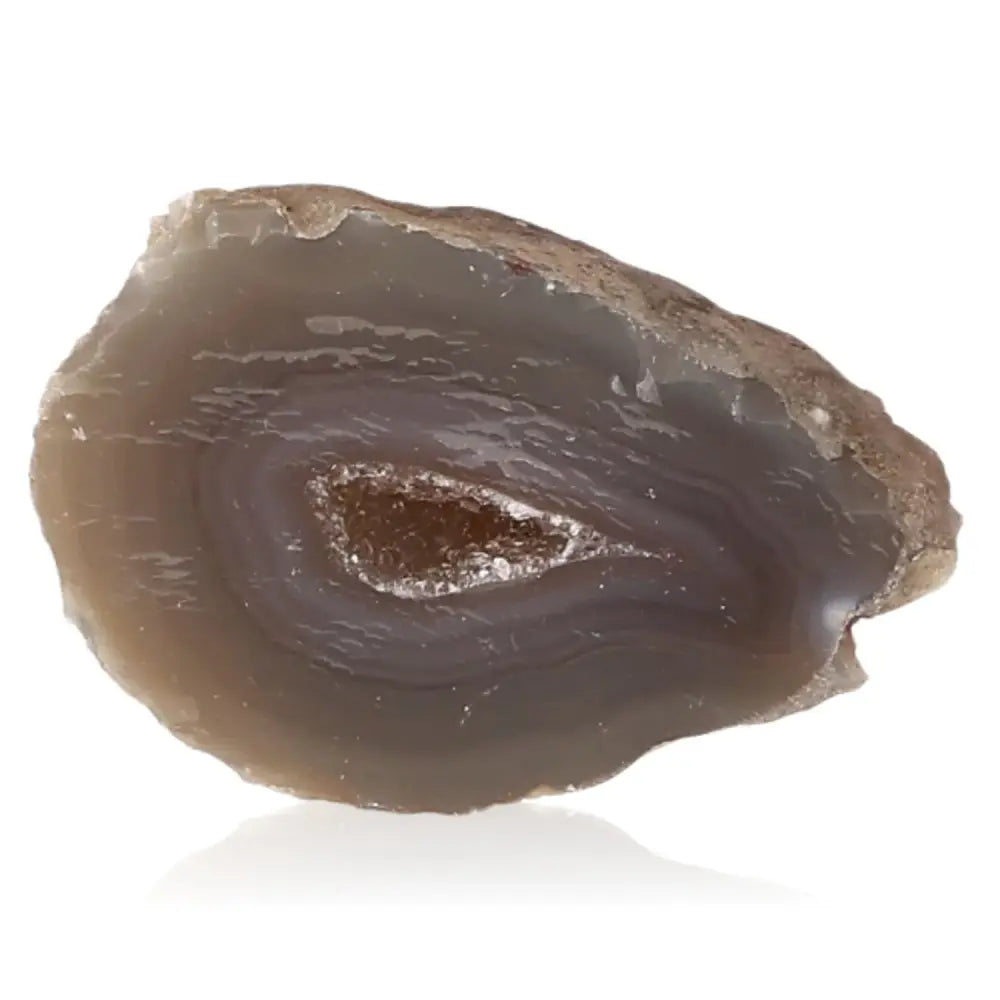 Mini Agate Geode with intricate patterns and soothing hues, symbolizing tranquility and emotional balance.