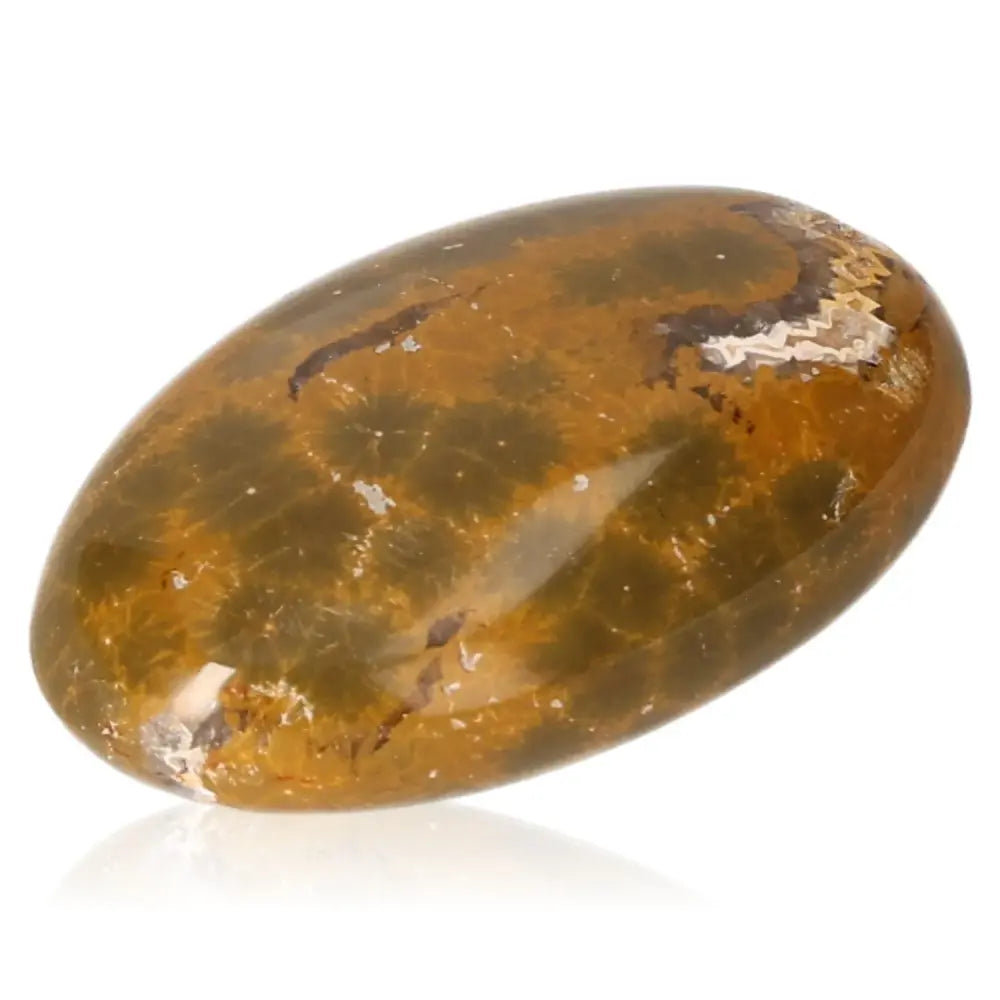 Tumbled Jasper gemstone with blue and golden tones for courage and spiritual insight, activating solar plexus energy.