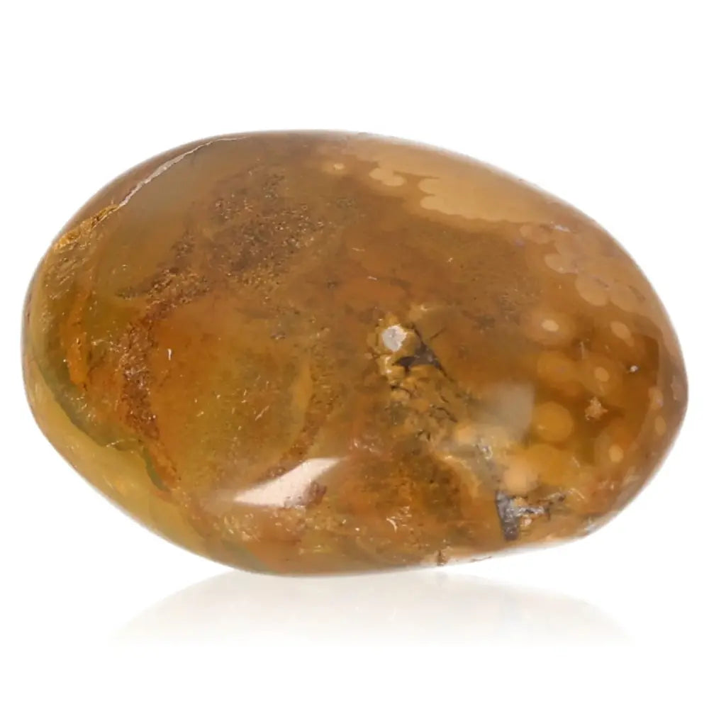 Tumbled Jasper stone with golden and blue hues, known for Solar Plexus Chakra activation and promoting courage and emotional balance.