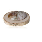 Tumbled Jasper stone displayed on a wooden base, highlighting its earthy swirls and polished surface, perfect for tranquility and decor.