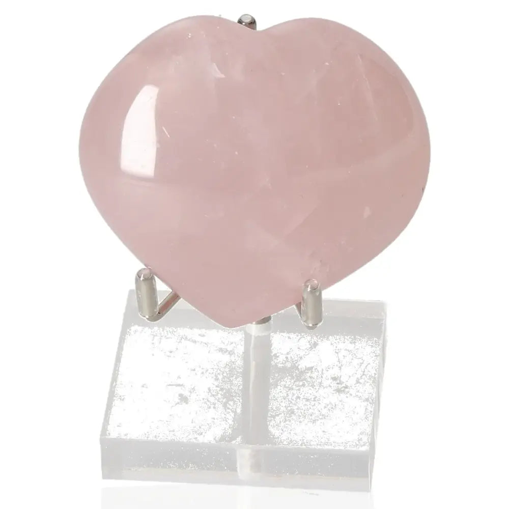 Rose Quartz Heart by Sylvia Crystals on display, symbolizing love, compassion, and healing, crafted from natural rose quartz.