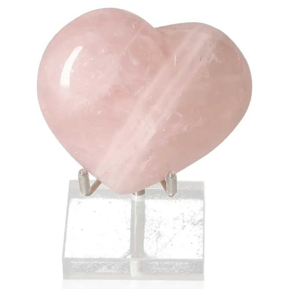 Rose Quartz Heart from Sylvia Crystals, symbolizing love and harmony, made from ethically sourced natural rose quartz. Ideal gift or meditation tool.
