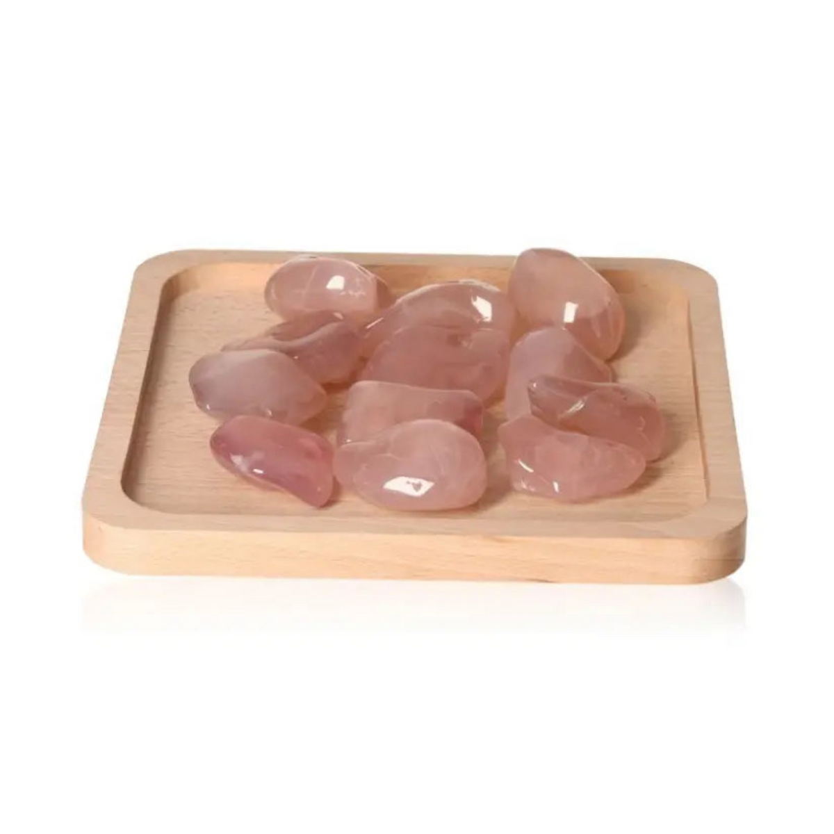 Pink Chalcedony XXL healing crystals on wooden tray, promoting emotional balance and protection from stress and anxiety.