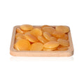 Orange Calcite Palm Stones on a wooden tray, enhancing self-confidence, motivation, and learning, ideal for energy and concentration boost.
