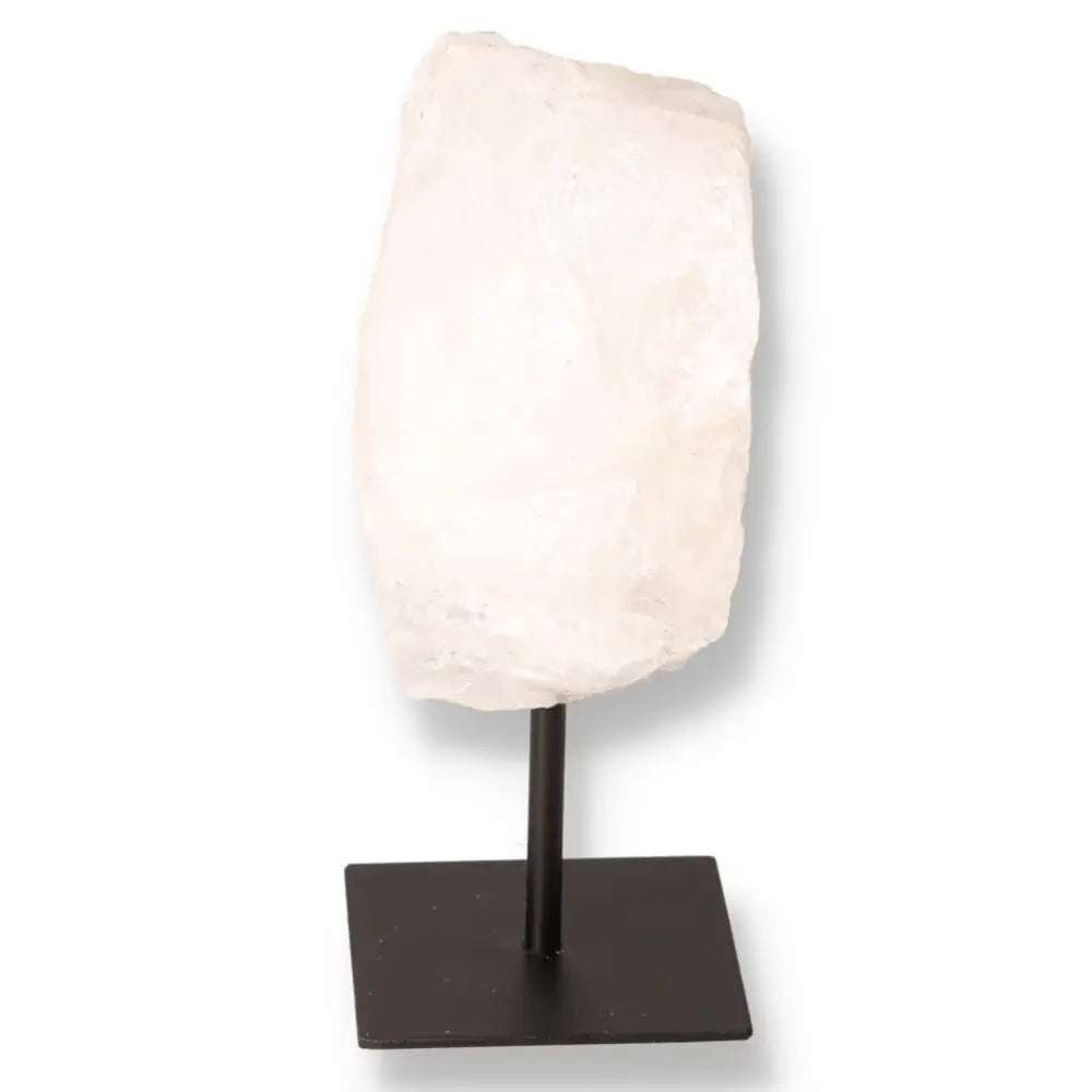 Cut Milky Quartz on Metal Stand, luxurious and spiritual home decor piece by Sylvia Crystals, showcasing Earth’s natural artistry.