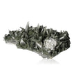 Green quartz crystal cluster showcasing unique geometry and natural allure on a white background