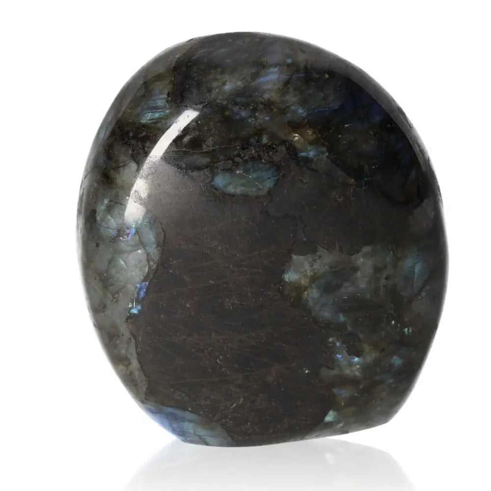 Polished cut base labradorite stone by Sylvia Crystals showcasing vibrant color flashes and elegant design, 100% natural and ethically sourced.