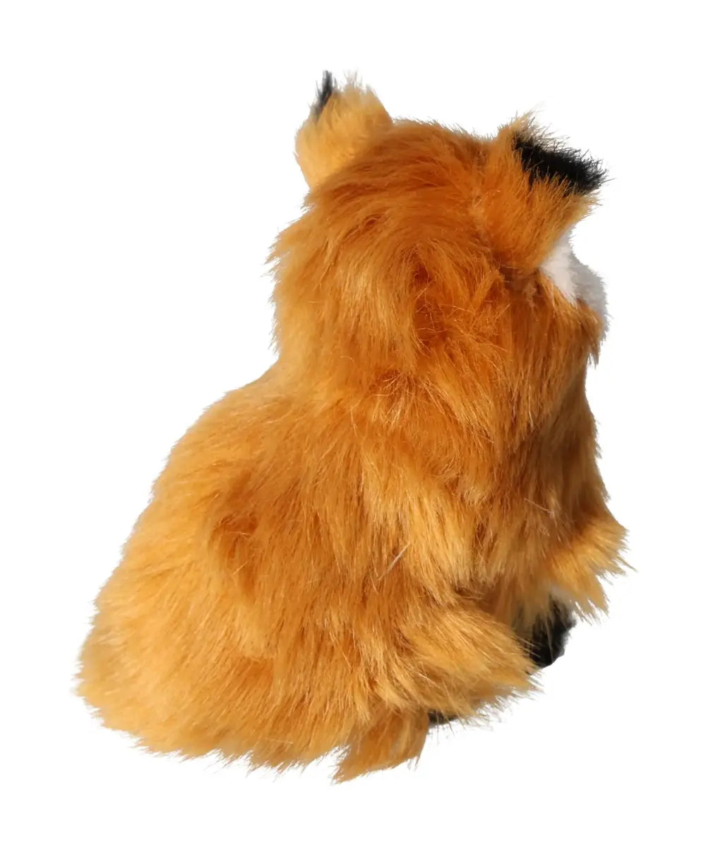 Back view of a plush, orange-furred fox figurine, showcasing its texture and shape, essential for home decor enthusiasts.
