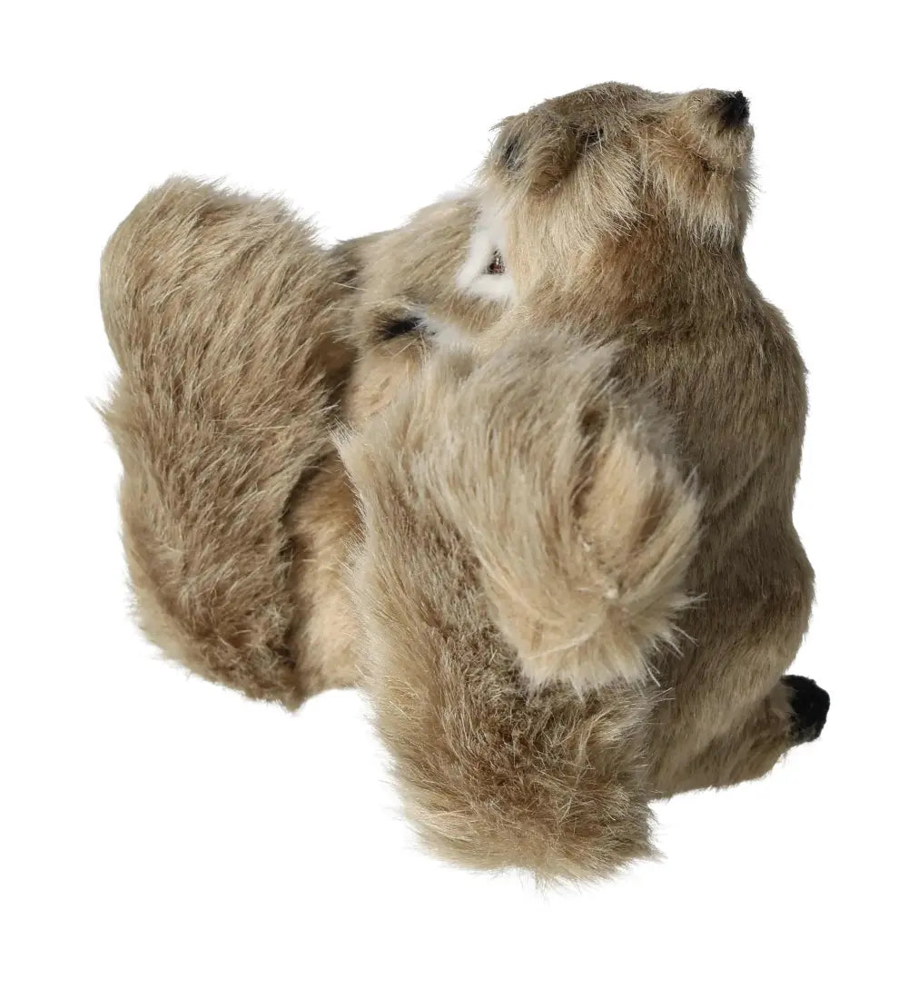 Plush squirrel figurine with realistic fur texture, showcasing intricate craftsmanship perfect for home decor elegance.