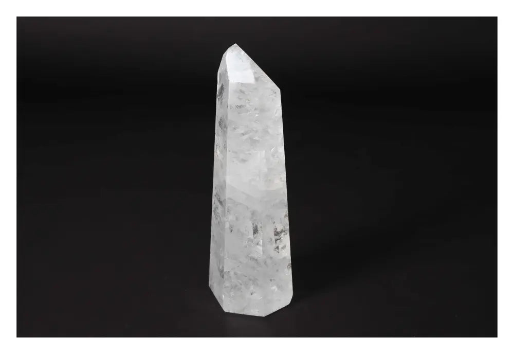Clear Crystal Quartz Point for spiritual harmony from Sylvia Crystals, showcasing luxury and transformative elegance.