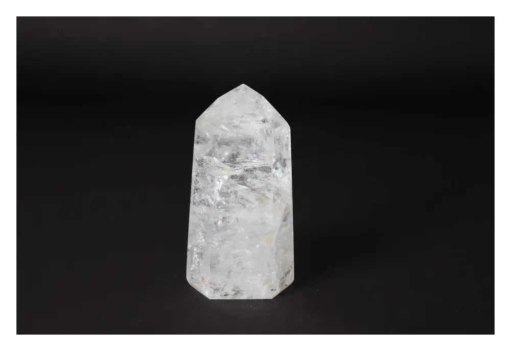 Clear Crystal Quartz Point with exceptional clarity, perfect for spiritual growth and healing, by Sylvia Crystals.
