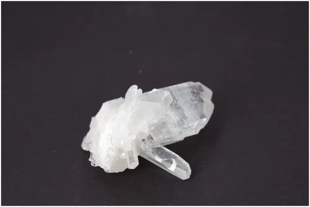 Rough Crystal Quartz Cluster showcasing natural beauty and metaphysical appeal, perfect for enhancing spiritual energies and decor.
