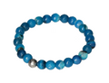 Blue Agate 6 mm Bracelet 634199 P10 featuring polished beads on elastic, emanating calming blue tones and serene elegance.