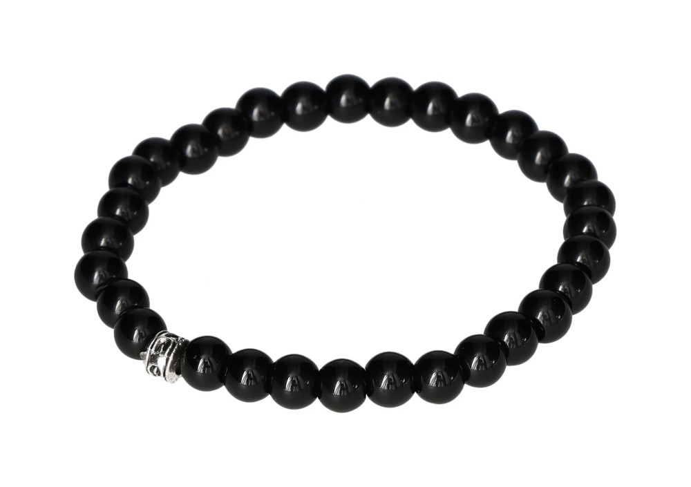 Sleek Obsydian 6 mm Bracelet 17 cm 634472 P10 with polished black beads and elastic band offering style and grounding properties.